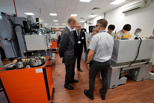Duke of Kent viewing engineering facilities at Cannock College