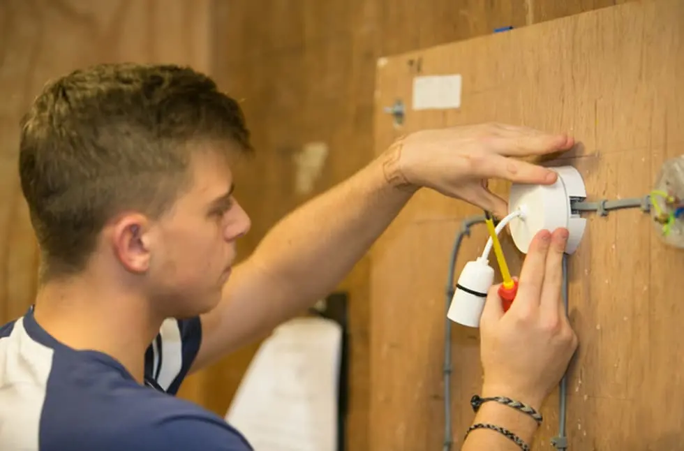 Electrical students working on some wiring