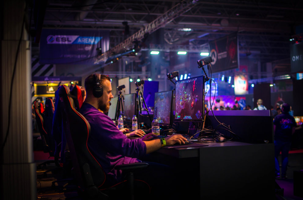 Man play video game at an esports competition