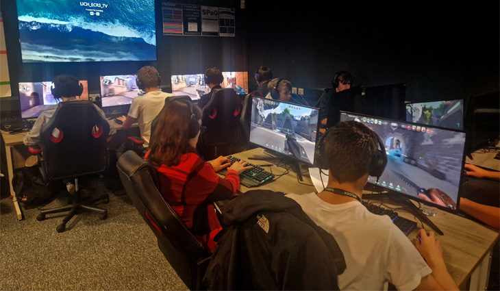 A photo of a group of Esports students playing computer games