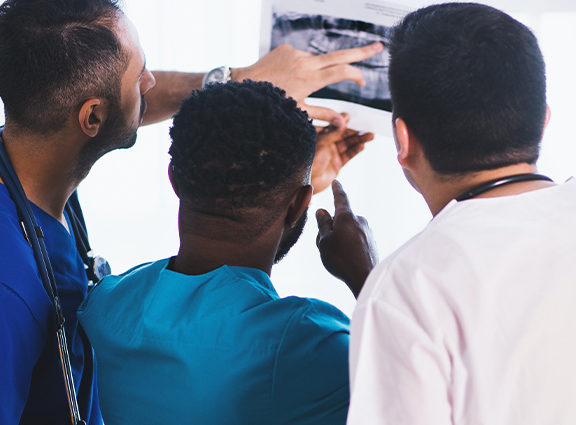 Doctors looking at x-ray