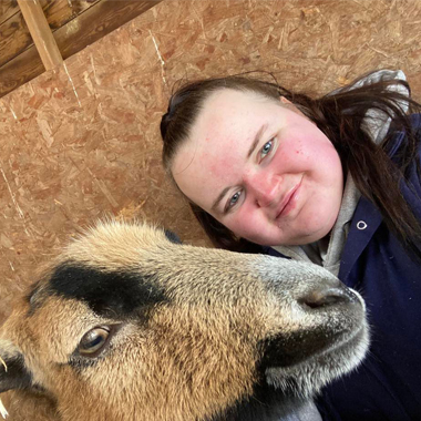 Animal Management student Amy Deeley with Cameroon Sheep