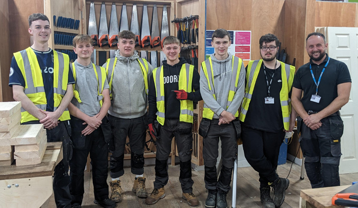 Carpentry students with Dan Tucker 730x425