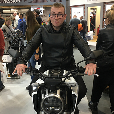 Craig Dougall, Princes Trust course sitting on a motorbike
