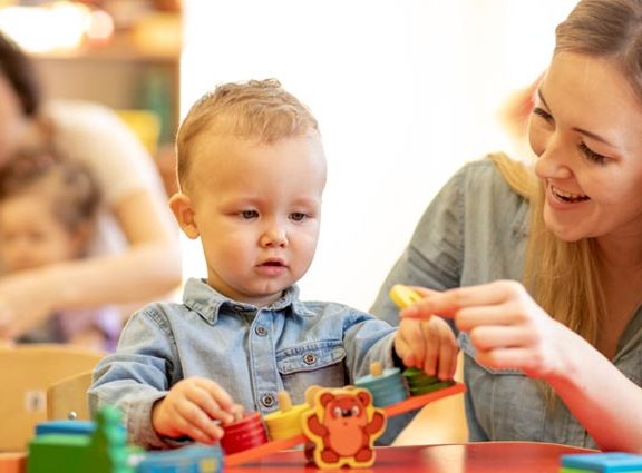 Woman playing with a child