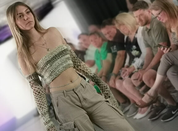 Photo of Fashion student Eve Heaps on the catwalk in fashion show