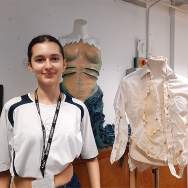 Photo of Lily-Rose Thompson in front of Fashion mannequins