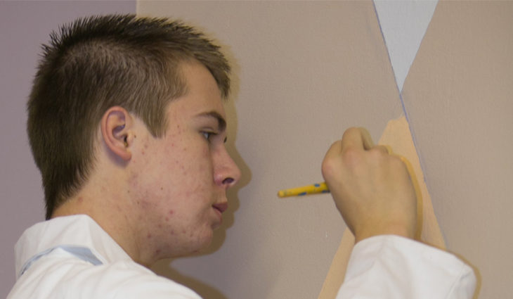 Man painting a wall