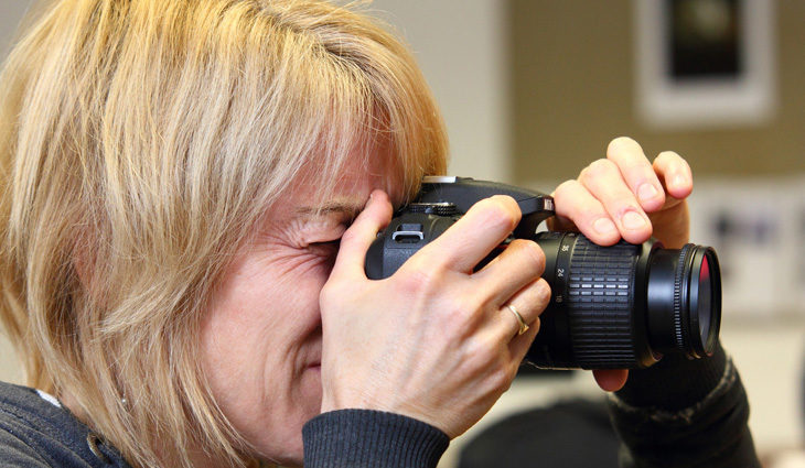 Photography Student Using Camera