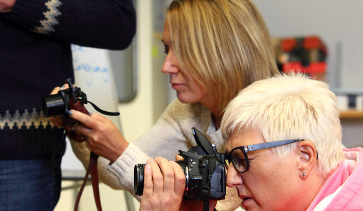 Photography Students Using Cameras