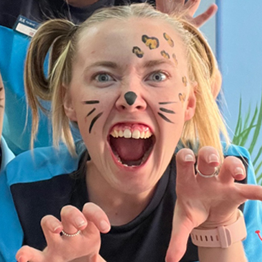 Photo of Ellie Jinks wearing face paint working as a kids rep