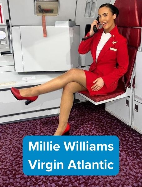 Former travel student Millie Williams sitting on plane holding phone working for Virgin Atlantic