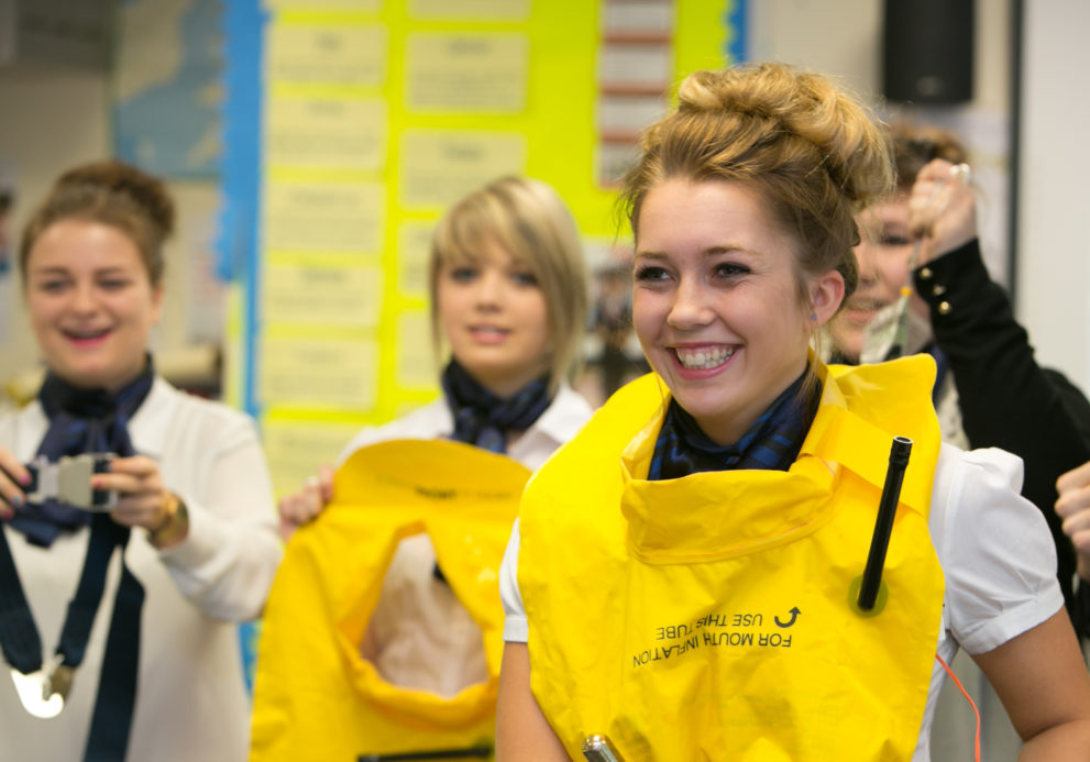 Travel student wearing life vest