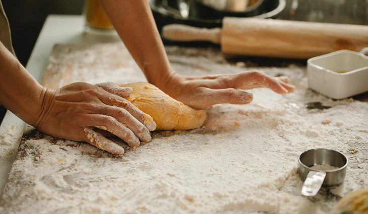 Person making bread