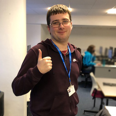 Student, Will Stead, giving a thumbs up