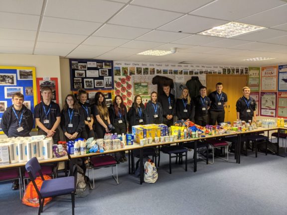 Public Services students with food for food bank