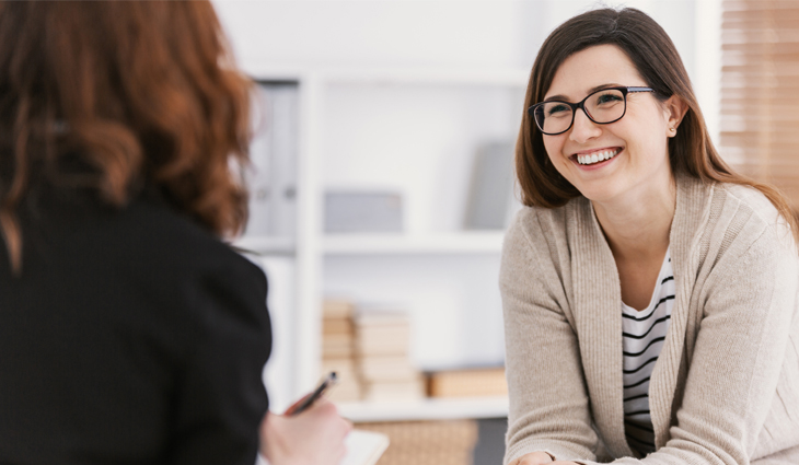 Woman smiling during counselling session