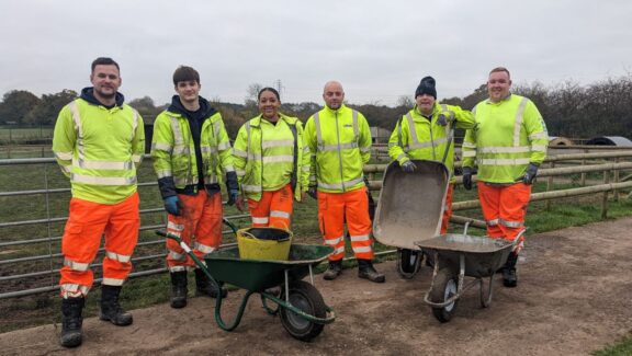 Group shot of Carnell staff volunteering at Rodbaston Animal Zone