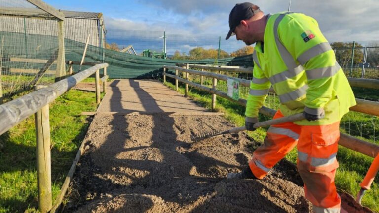 Carnell staff member working on Rodbaston Animal Zone path