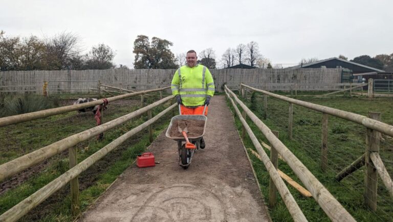 Carnell staff member working on Rodbaston Animal Zone path