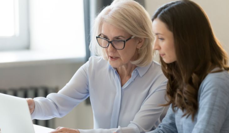 Person mentoring a colleague