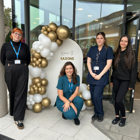 Staff and students standing outside Saxons Salon