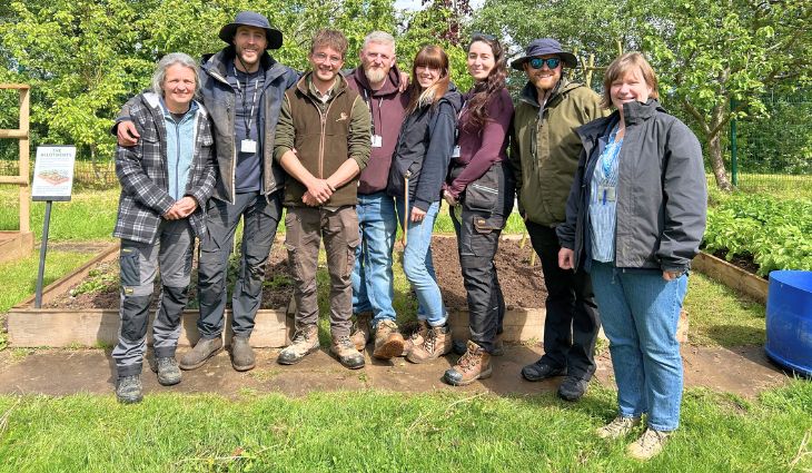 Group photo of RHS Level 3 Practical students outside with tutor